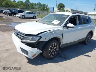 2021 Volkswagen Tiguan SE with VIN 3VV2B7AX4MM031490, listed as a IAAI auction lot 41829654 with 55,739 mi miles. Bid and sale history available at carsss.com. Image 6.