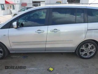 2009 Mazda 5 Sport z VIN JM1CR293090355422, wystawiony jako IAAI lot #42567279 z przebiegiem 214 402 mil mil oraz . Historia ofert i sprzedaży dostępna na DreamBid. Obrazek 14.