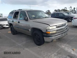 2001 Chevrolet Tahoe LS z VIN 1GNEC13T71R199027, wystawiony jako IAAI lot #41546283 z przebiegiem 232 905 mil mil oraz . Historia ofert i sprzedaży dostępna na DreamBid. Obrazek 1.
