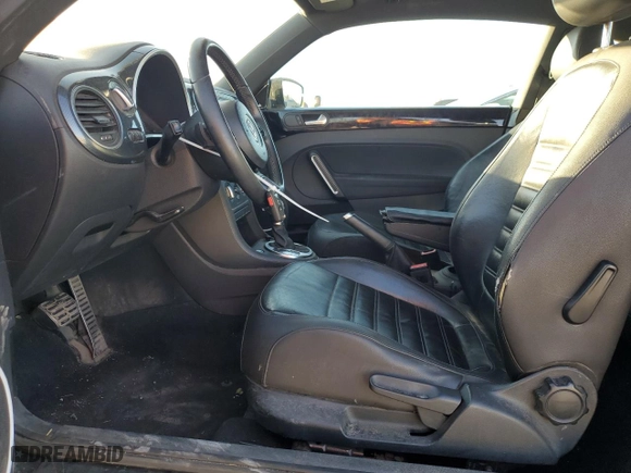 2012 Volkswagen Beetle 2.0T Turbo w/Sun/Sound PZEV with VIN 3VWVA7AT5CM628848, listed as a Copart auction lot 76992504 with 0 mi miles and Salvage Title. Bid and sale history available at carsss.com. Image 7.