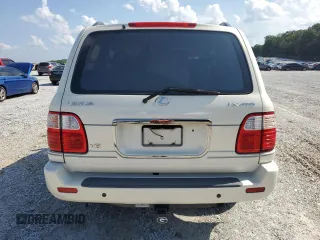 1999 Lexus LX 470 z VIN JT6HT00W1X0074382, wystawiony jako Copart lot #53612205 z przebiegiem 256 689 mil mil oraz Szkoda całkowita • Salvage title. Historia ofert i sprzedaży dostępna na DreamBid. Obrazek 6.