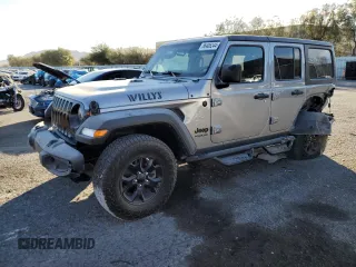2021 Jeep Wrangler Unlimited Willys with VIN 1C4HJXDM6MW731668, listed as a Copart auction lot 86406244 with 73,414 mi miles and Salvage Title. Bid and sale history available at DreamBid. Image 1.