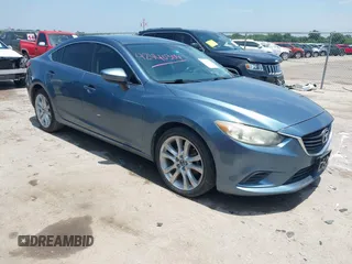 2014 Mazda 6 i Touring with VIN JM1GJ1V63E1152483, listed as a IAAI auction lot 42440304 with 186,060 mi miles and . Bid and sale history available at DreamBid. Image 1.