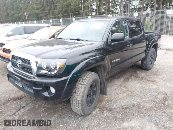 2011 Toyota Tacoma with VIN 3TMLU4EN1BM070300, listed as a IAAI auction lot 41710119 with 199,099 mi miles and . Bid and sale history available at DreamBid. Image 2.