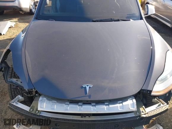2021 Tesla Model Y Long Range with VIN 5YJYGDEE5MF191142, listed as a IAAI auction lot 41448514 with 71,626 mi miles. Bid and sale history available at carsss.com. Image 10.