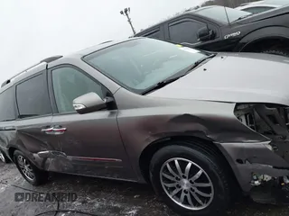 2011 Kia Sedona EX with VIN KNDMH4C71B6396661, listed as a IAAI auction lot 41412771 with 175,192 mi miles. Bid and sale history available at carsss.com. Image 13.