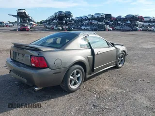 2004 Ford Mustang Standard z VIN 1FAFP40684F194867, wystawiony jako IAAI lot #39963442 z przebiegiem Nie podano mil oraz . Historia ofert i sprzedaży dostępna na DreamBid. Obrazek 4.