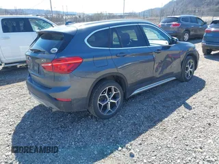 2017 BMW X1 sDrive28i with VIN WBXHU7C37H5H32815, listed as a IAAI auction lot 41837113 with 67,097 mi miles. Bid and sale history available at carsss.com. Image 4.