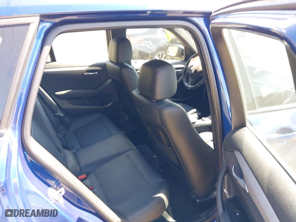 2015 BMW X1 sDrive28i with VIN WBAVM1C58FV314947, listed as a IAAI auction lot 41874472 with 128,271 mi miles. Bid and sale history available at carsss.com. Image 8.
