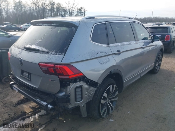 2019 Volkswagen Tiguan SEL Premium with VIN 3VV4B7AX3KM175019, listed as a IAAI auction lot 41374333 with 95,722 mi miles. Bid and sale history available at carsss.com. Image 4.