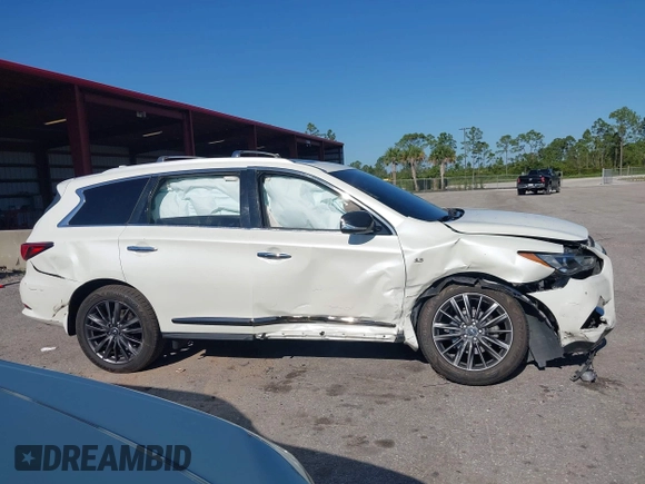 2020 Infiniti QX60 Luxe with VIN 5N1DL0MM3LC526479, listed as a IAAI auction lot 42044109 with 84,010 mi miles and . Bid and sale history available at DreamBid. Image 14.