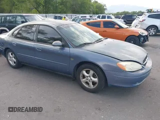 2001 Ford Taurus SES Standard z VIN 1FAHP55S71G130474, wystawiony jako IAAI lot #42475014 z przebiegiem 217 343 mil mil oraz . Historia ofert i sprzedaży dostępna na DreamBid. Obrazek 1.