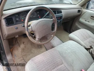 1995 Toyota T100 SR5 z VIN JT4VD12F0S0007793, wystawiony jako Copart lot #85020824 z przebiegiem 226 806 mil mil oraz Czysty tytuł • Clean title. Historia ofert i sprzedaży dostępna na DreamBid. Obrazek 8.