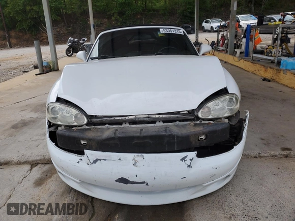 2004 Mazda MX-5 Miata LS z VIN JM1NB353640407864, wystawiony jako Copart lot #53951315 z przebiegiem 116 295 mil mil oraz Szkoda całkowita • Salvage title. Historia ofert i sprzedaży dostępna na DreamBid. Obrazek 5.