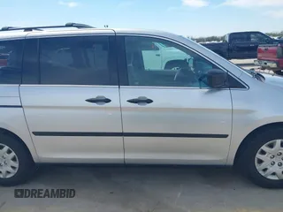 2010 Honda Odyssey LX z VIN 5FNRL3H29AB016884, wystawiony jako IAAI lot #41652673 z przebiegiem 162 068 mil mil oraz . Historia ofert i sprzedaży dostępna na DreamBid. Obrazek 14.
