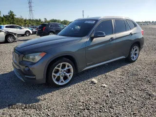 2014 BMW X1 sDrive28i with VIN WBAVM1C59EVW50475, listed as a Copart auction lot 52311335 with 126,820 mi miles and Salvage Title. Bid and sale history available at carsss.com. Image 1.