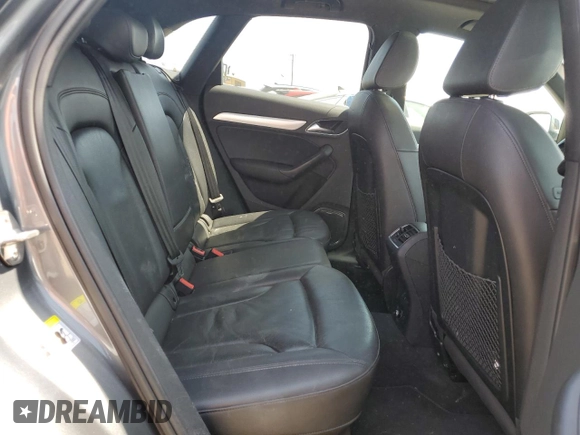 2015 Audi Q3 Prestige with VIN WA1GFCFS8FR009731, listed as a Copart auction lot 59897225 with 84,138 mi miles and Salvage title. Bid and sale history available at DreamBid. Image 11.