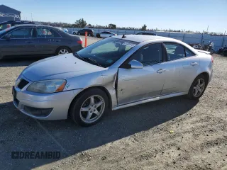 2009 Pontiac G6 with VIN 1G2ZJ57N994252228, listed as a Copart auction lot 41430975 with 195,404 mi miles and Salvage title. Bid and sale history available at DreamBid. Image 1.