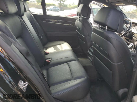 2013 BMW 7 Series 740i with VIN WBAYA6C58DC994974, listed as a Copart auction lot 55534645 with 106,975 mi miles and Salvage title. Bid and sale history available at DreamBid. Image 10.