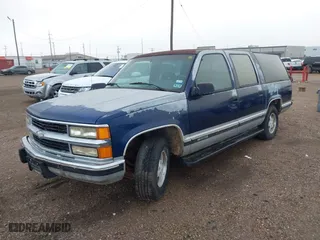 1994 Chevrolet Suburban with VIN 1GNEC16K3RJ360549, listed as a IAAI auction lot 42080890 with 126,804 mi miles. Bid and sale history available at carsss.com. Image 2.