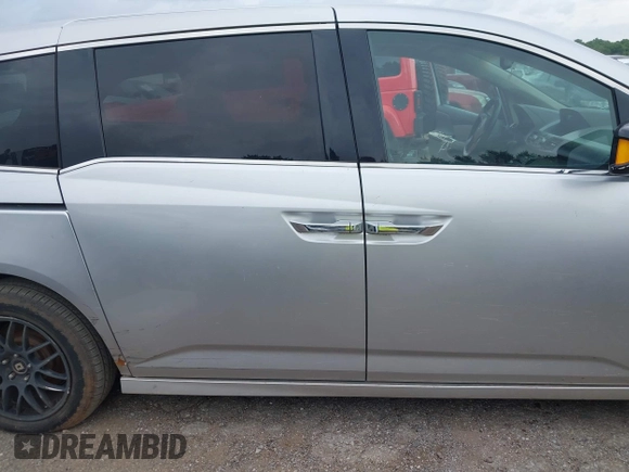 2011 Honda Odyssey Touring with VIN 5FNRL5H93BB071518, listed as a IAAI auction lot 42402421 with 227,647 mi miles and . Bid and sale history available at DreamBid. Image 13.