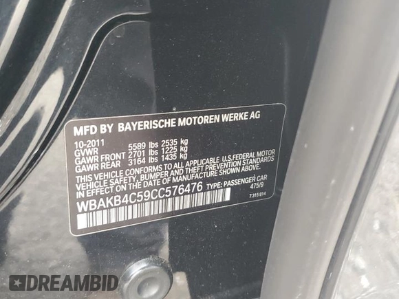2012 BMW 7 Series 740Li with VIN WBAKB4C59CC576476, listed as a Copart auction lot 55670215 with 100,907 mi miles and Salvage title. Bid and sale history available at DreamBid. Image 12.