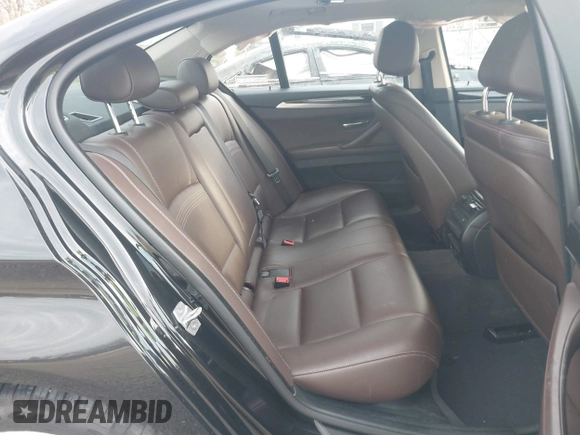 2014 BMW 5 Series 528i xDrive with VIN WBA5A7C52ED616976, listed as a IAAI auction lot 42067334 with 98,286 mi miles and . Bid and sale history available at DreamBid. Image 8.