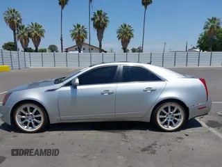 2008 Cadillac CTS RWD z VIN 1G6DV57V880153063, wystawiony jako IAAI lot #42440277 z przebiegiem 158 312 mil mil oraz . Historia ofert i sprzedaży dostępna na DreamBid. Obrazek 14.