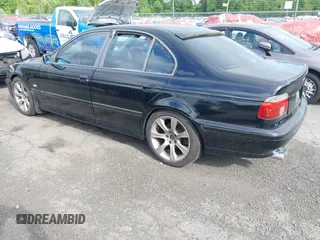 1997 BMW 5 Series 540i z VIN WBADE5324VBV92704, wystawiony jako IAAI lot #42305703 z przebiegiem 202 371 mil mil oraz . Historia ofert i sprzedaży dostępna na DreamBid. Obrazek 3.