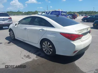 2014 Hyundai Sonata SE with VIN 5NPEC4AC0EH875408, listed as a IAAI auction lot 41913833 with 87,001 mi miles and . Bid and sale history available at DreamBid. Image 3.