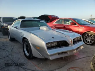 1977 Pontiac Firebird z VIN 2W87Z7N152633, wystawiony jako Copart lot #41438935 z przebiegiem 17 837 mil mil oraz Nie do naprawy. Historia ofert i sprzedaży dostępna na DreamBid. Obrazek 4.