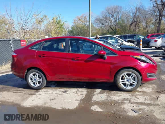 2017 Ford Fiesta SE z VIN 3FADP4BJ6HM143379, wystawiony jako IAAI lot #40863748 z przebiegiem 77 325 mil mil oraz . Historia ofert i sprzedaży dostępna na DreamBid. Obrazek 13.