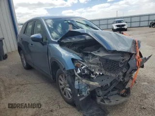 2015 Mazda CX-5 Sport with VIN JM3KE2BE8F0472199, listed as a Copart auction lot 49609725 with 145,401 mi miles and Salvage Title. Bid and sale history available at carsss.com. Image 4.