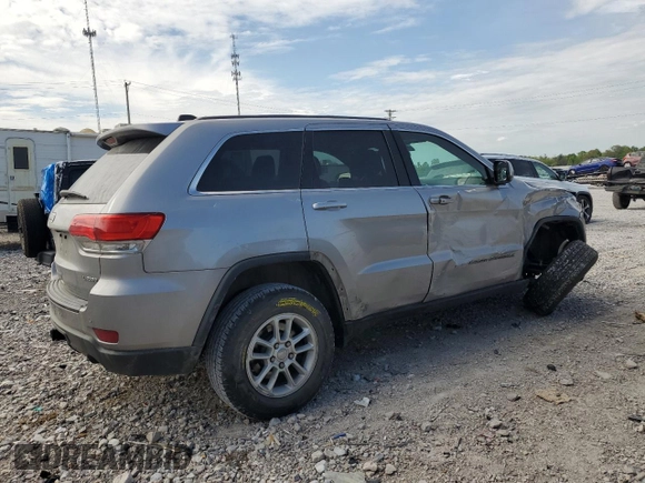 2018 Jeep Grand Cherokee Laredo with VIN 1C4RJFAG4JC122038, listed as a Copart auction lot 54351465 with 101,314 mi miles and Salvage title. Bid and sale history available at DreamBid. Image 3.