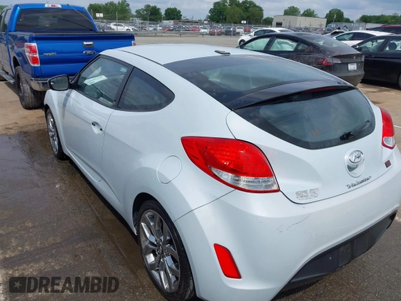 2015 Hyundai Veloster z VIN KMHTC6AD8FU222744, wystawiony jako IAAI lot #42129397 z przebiegiem Nie podano mil oraz . Historia ofert i sprzedaży dostępna na DreamBid. Obrazek 3.