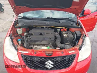 2009 Suzuki SX4 Sport FWD with VIN JS2YC414596200021, listed as a IAAI auction lot 40753192 with 144,805 mi miles and . Bid and sale history available at DreamBid. Image 10.