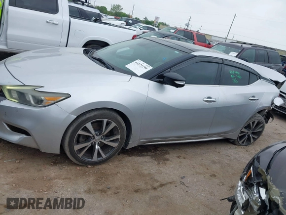 2016 Nissan Maxima SL with VIN 1N4AA6AP2GC386239, listed as a IAAI auction lot 41871290 with 175,941 mi miles and . Bid and sale history available at DreamBid. Image 14.