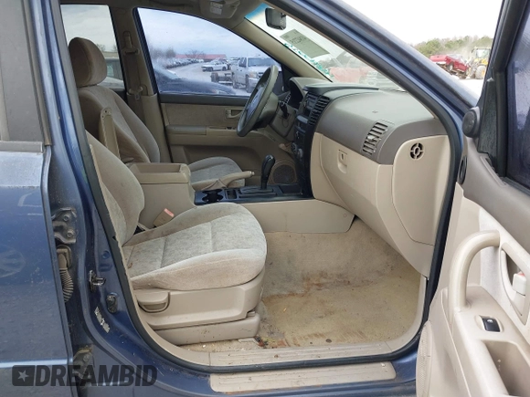 2004 Kia Sorento LX with VIN KNDJC733545221418, listed as a IAAI auction lot 41842215 with 129,177 mi miles. Bid and sale history available at carsss.com. Image 5.