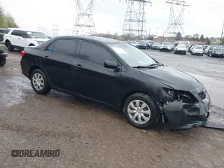 2010 Toyota Corolla with VIN 1NXBU4EE8AZ325526, listed as a IAAI auction lot 42027713 with 122,524 mi miles. Bid and sale history available at carsss.com. Image 1.