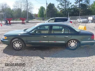 2000 Lincoln Continental with VIN 1LNHM97VXYY759969, listed as a IAAI auction lot 41892082 with 114,389 mi miles and . Bid and sale history available at DreamBid. Image 14.