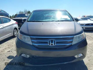 2012 Honda Odyssey Touring with VIN 5FNRL5H91CB057344, listed as a IAAI auction lot 41835272 with 158,854 mi miles. Bid and sale history available at carsss.com. Image 12.