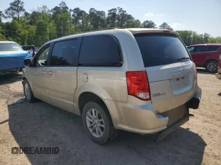 2013 Dodge Grand Caravan SXT with VIN 2C4RDGCG0DR639634, listed as a Copart auction lot 52548075 with 27,799 mi miles and Salvage Title. Bid and sale history available at DreamBid. Image 2.