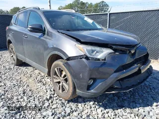 2018 Toyota RAV4 XLE with VIN 2T3WFREV2JW450019, listed as a IAAI auction lot 41704084 with 257,737 mi miles. Bid and sale history available at carsss.com. Image 1.