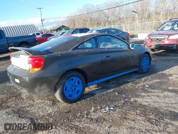 2000 Toyota Celica GT with VIN JTDDR32TXY0061397, listed as a IAAI auction lot 41264249 with 256,280 mi miles. Bid and sale history available at carsss.com. Image 4.