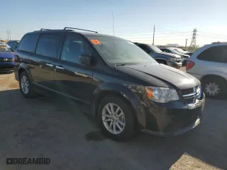 2016 Dodge Grand Caravan SXT with VIN 2C4RDGCG9GR380596, listed as a Copart auction lot 53657385 with 211,744 mi miles and Clean Title. Bid and sale history available at carsss.com. Image 4.