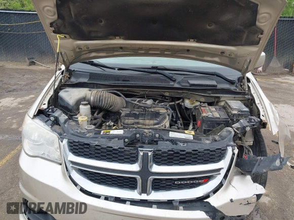 2013 Dodge Grand Caravan Crew with VIN 2C4RDGDG7DR624563, listed as a IAAI auction lot 42038157 with 265,044 mi miles and . Bid and sale history available at DreamBid. Image 10.