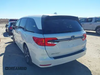 2023 Honda Odyssey Touring with VIN 5FNRL6H88PB003865, listed as a IAAI auction lot 41715384 with 40,765 mi miles and . Bid and sale history available at DreamBid. Image 3.