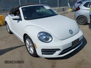 2017 Volkswagen Beetle S with VIN 3VW517AT5HM822139, listed as a IAAI auction lot 42778864 with 62,923 mi miles and . Bid and sale history available at DreamBid. Image 1.