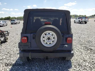 1997 Jeep Wrangler SE with VIN 1J4FY29P2VP446786, listed as a Copart auction lot 52295305 with 0 mi miles and Salvage Title. Bid and sale history available at carsss.com. Image 6.