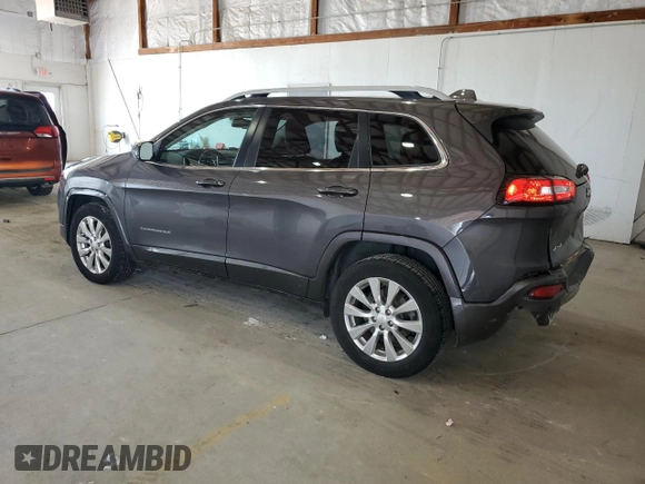 2018 Jeep Cherokee Overland with VIN 1C4PJMJXXJD594749, listed as a Copart auction lot 56049145 with 178,471 mi miles and Salvage title. Bid and sale history available at DreamBid. Image 2.